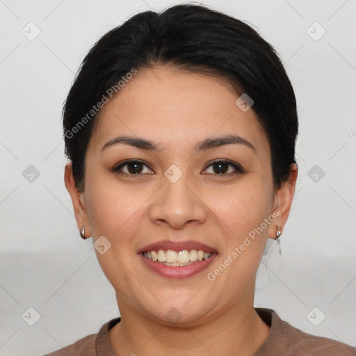 Joyful latino young-adult female with short  brown hair and brown eyes