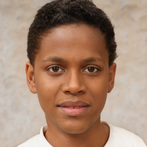 Joyful black young-adult male with short  brown hair and brown eyes
