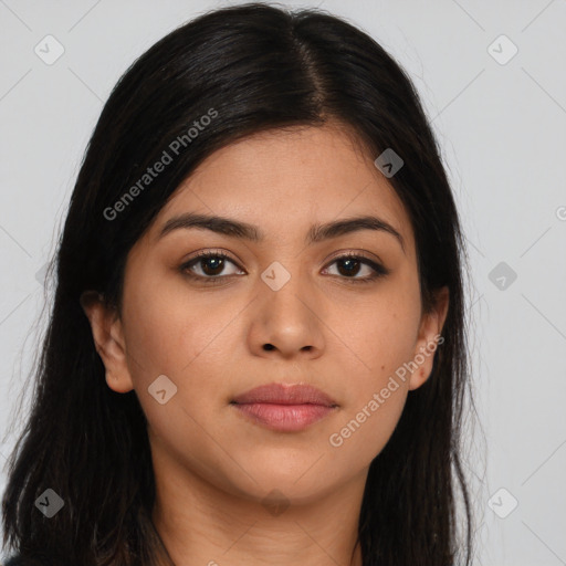 Joyful latino young-adult female with long  brown hair and brown eyes