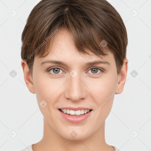 Joyful white young-adult female with short  brown hair and grey eyes