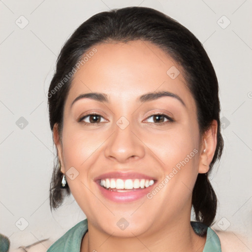 Joyful white young-adult female with medium  black hair and brown eyes