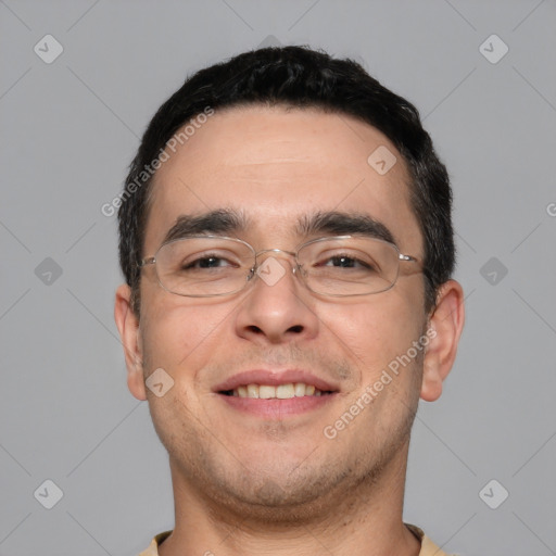 Joyful white young-adult male with short  black hair and brown eyes