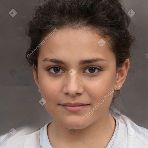 Joyful white child female with short  brown hair and brown eyes