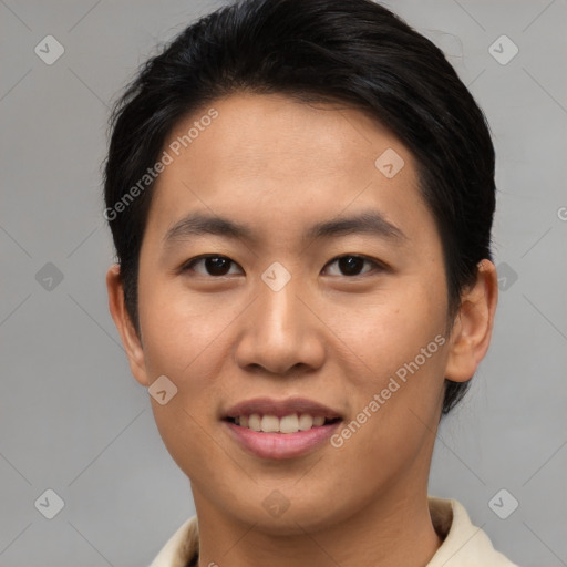 Joyful asian young-adult male with short  brown hair and brown eyes