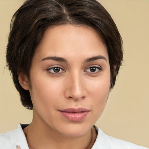 Neutral white young-adult female with medium  brown hair and brown eyes