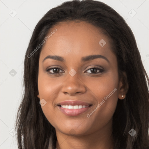 Joyful latino young-adult female with long  brown hair and brown eyes