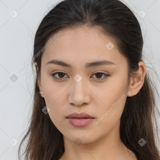 Neutral white young-adult female with long  brown hair and brown eyes