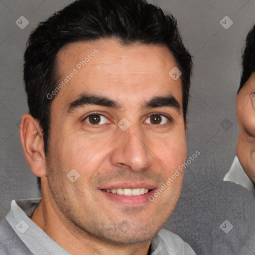 Joyful white adult male with short  brown hair and brown eyes