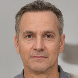 Neutral white middle-aged male with short  brown hair and brown eyes