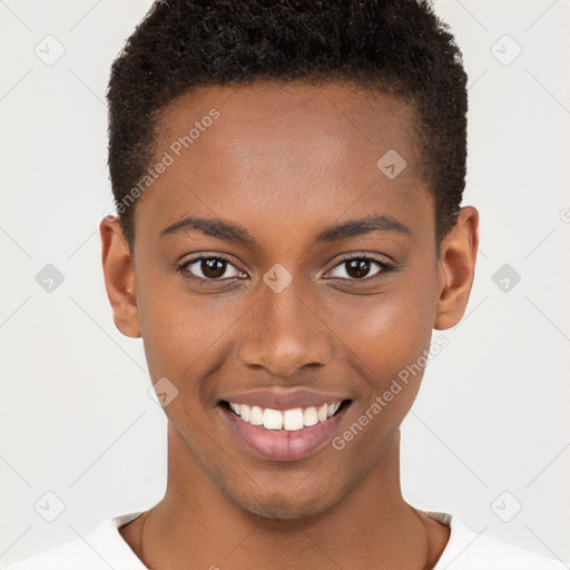 Joyful black young-adult female with short  brown hair and brown eyes