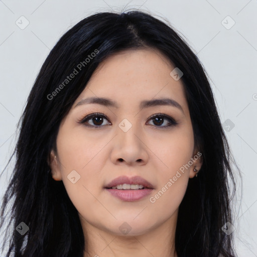 Joyful asian young-adult female with long  black hair and brown eyes