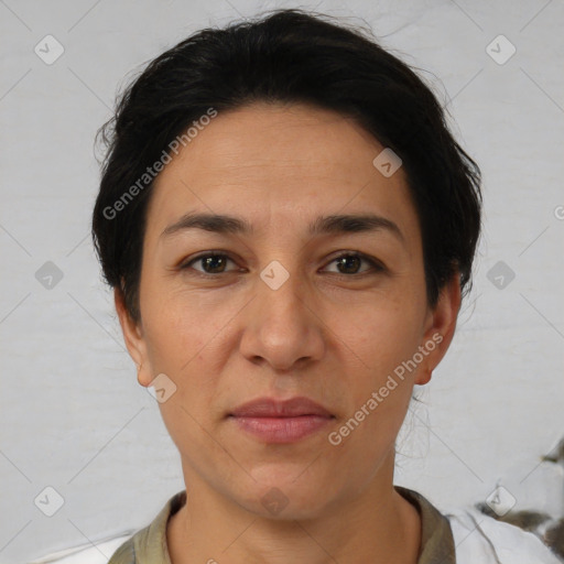 Joyful white adult female with short  brown hair and brown eyes