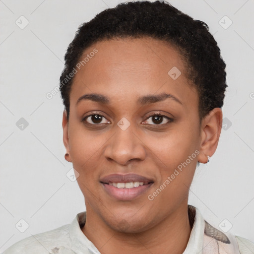 Joyful latino young-adult female with short  black hair and brown eyes