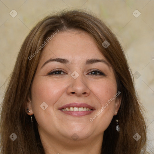 Joyful white adult female with long  brown hair and brown eyes