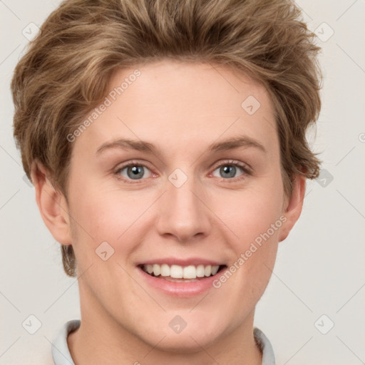 Joyful white young-adult female with short  brown hair and grey eyes