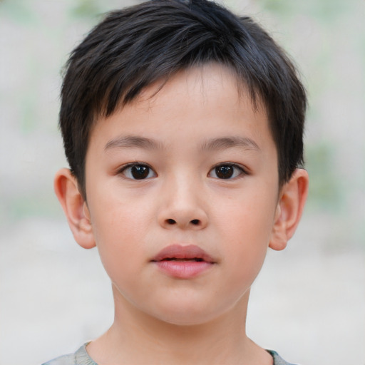 Neutral asian child male with short  brown hair and brown eyes