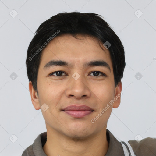 Joyful latino young-adult male with short  black hair and brown eyes