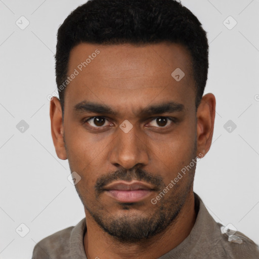 Neutral latino young-adult male with short  black hair and brown eyes
