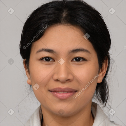 Joyful asian young-adult female with medium  black hair and brown eyes