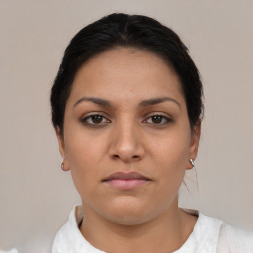 Neutral latino young-adult female with short  brown hair and brown eyes