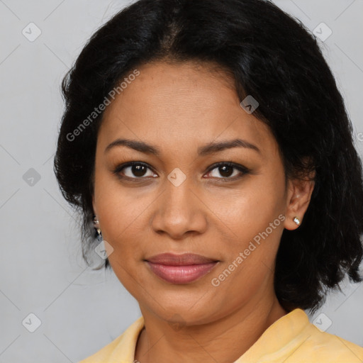 Joyful latino adult female with medium  brown hair and brown eyes