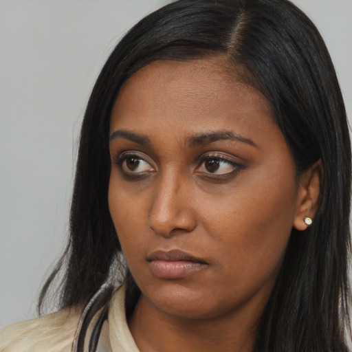 Neutral asian young-adult female with long  brown hair and brown eyes