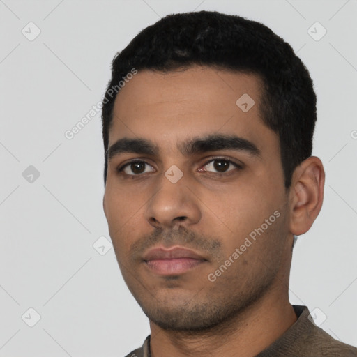Neutral latino young-adult male with short  black hair and brown eyes