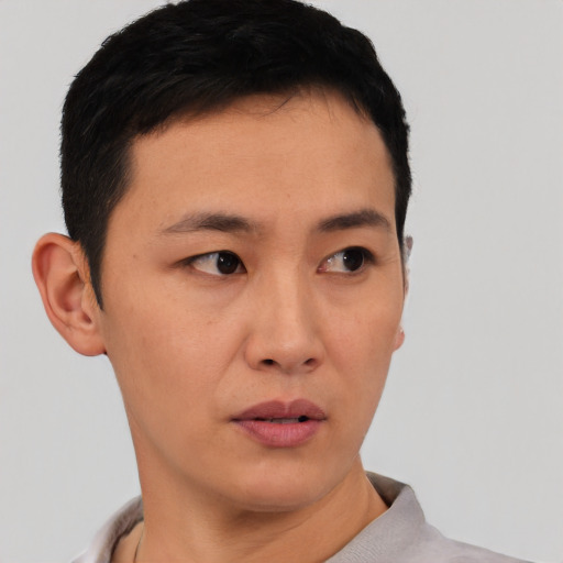 Neutral asian young-adult male with short  black hair and brown eyes