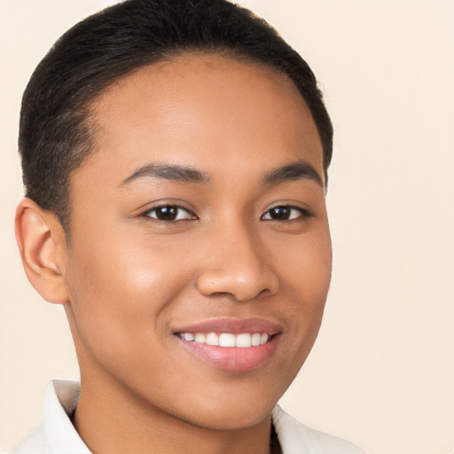 Joyful latino young-adult female with short  brown hair and brown eyes