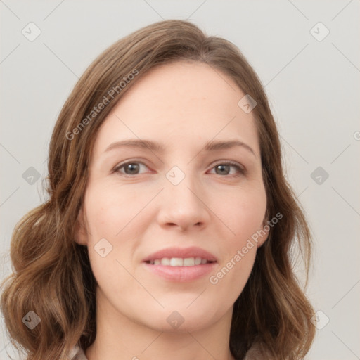 Joyful white young-adult female with medium  brown hair and green eyes