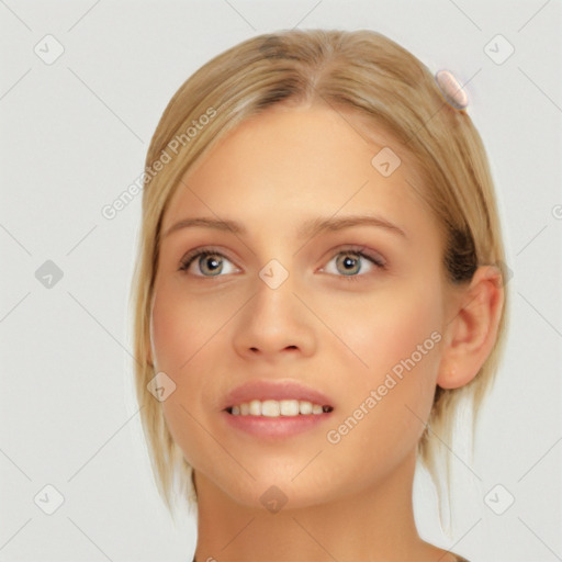 Joyful white young-adult female with medium  brown hair and blue eyes