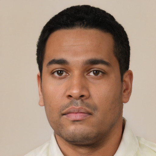 Neutral latino young-adult male with short  black hair and brown eyes