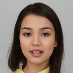 Joyful asian young-adult female with medium  brown hair and brown eyes