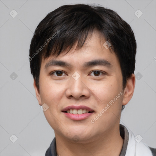 Joyful white young-adult male with short  black hair and brown eyes