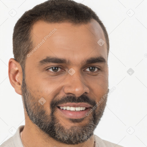 Joyful black young-adult male with short  brown hair and brown eyes