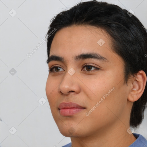 Neutral white young-adult male with short  black hair and brown eyes