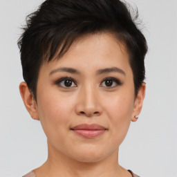 Joyful asian young-adult female with short  brown hair and brown eyes