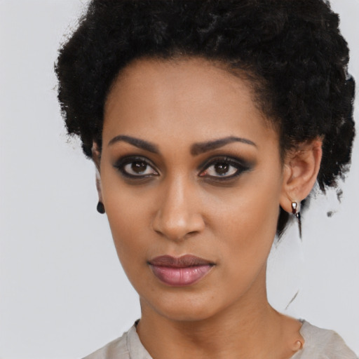 Neutral black young-adult female with short  black hair and brown eyes
