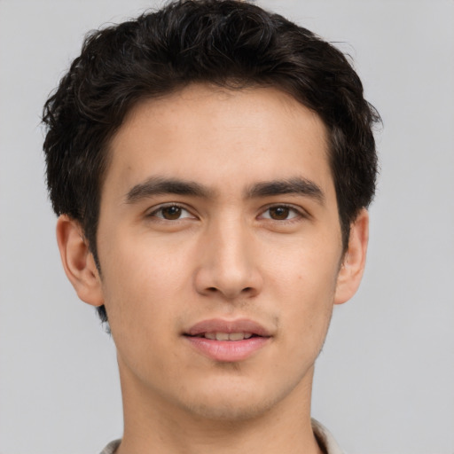 Neutral asian young-adult male with short  brown hair and brown eyes