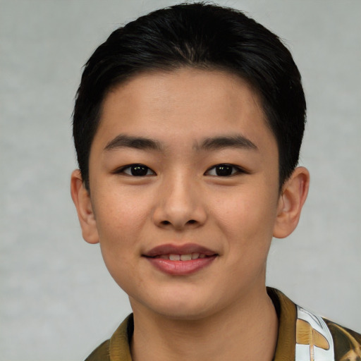 Joyful asian young-adult male with short  brown hair and brown eyes