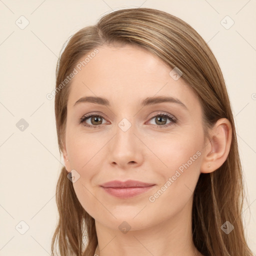 Joyful white young-adult female with long  brown hair and blue eyes