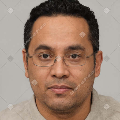 Neutral white adult male with short  black hair and brown eyes