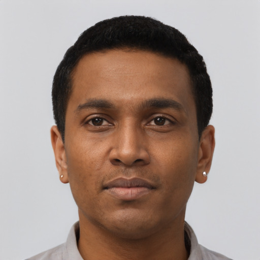 Neutral black young-adult male with short  black hair and brown eyes