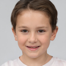 Joyful white child female with short  brown hair and brown eyes