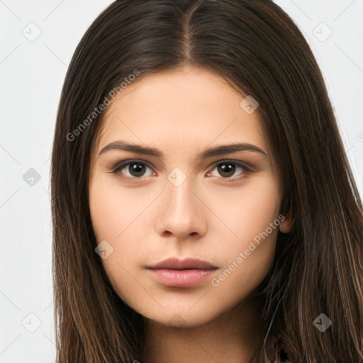 Neutral white young-adult female with long  brown hair and brown eyes