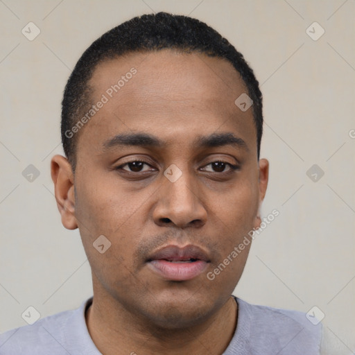 Neutral latino young-adult male with short  black hair and brown eyes