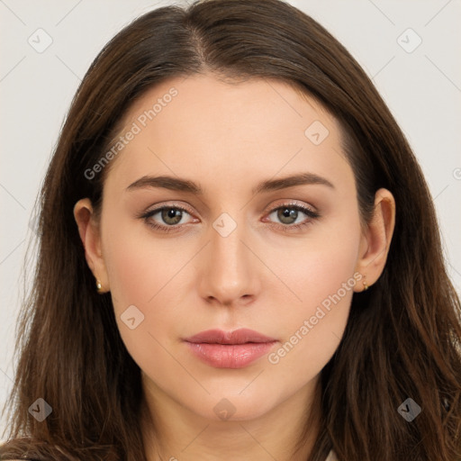 Neutral white young-adult female with long  brown hair and brown eyes