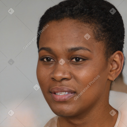 Joyful black young-adult female with short  black hair and brown eyes