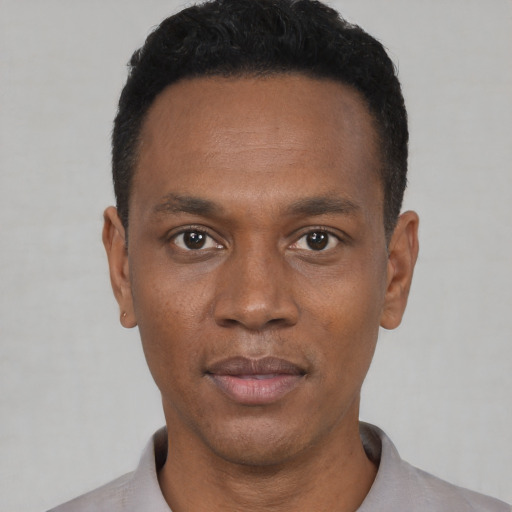 Neutral black young-adult male with short  black hair and brown eyes