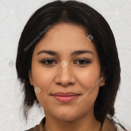 Joyful latino young-adult female with medium  brown hair and brown eyes